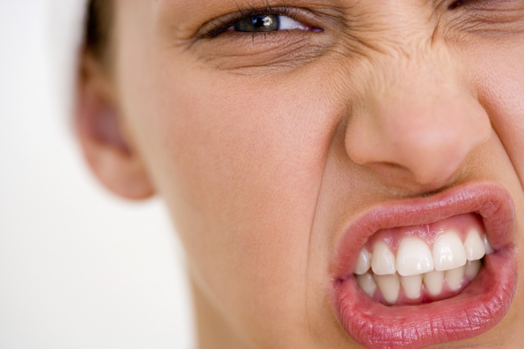 Woman with angry facial expression