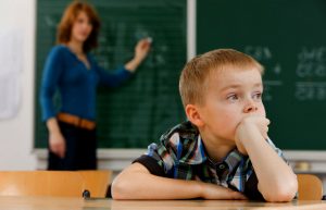 Distracted Student in Classroom --- Image by © Wolfgang Flamisch/Corbis